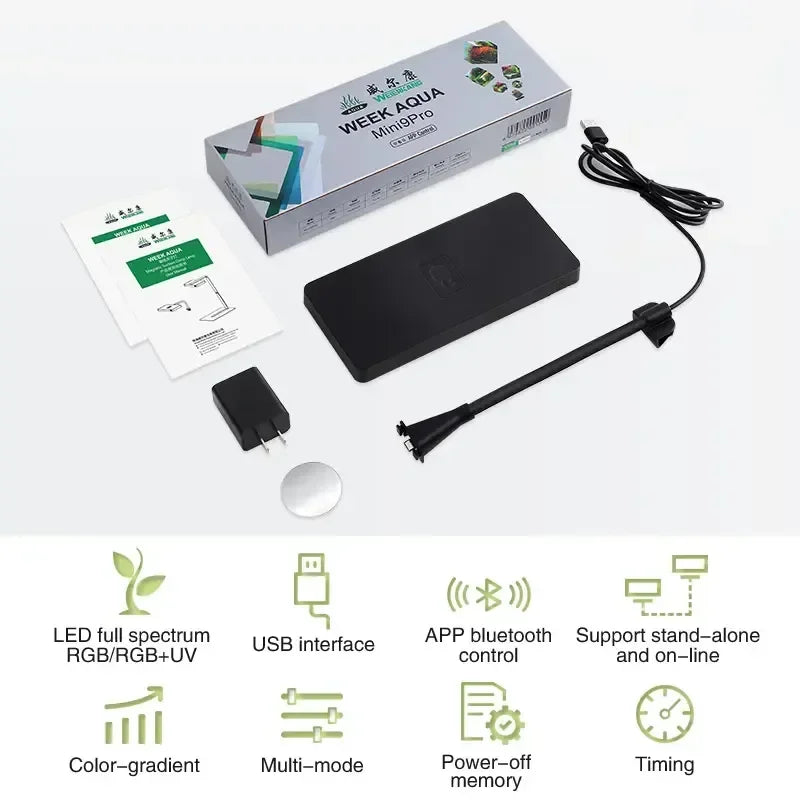 Set of aquarium equipment including a power adapter, cable, and packaging on a white background.
