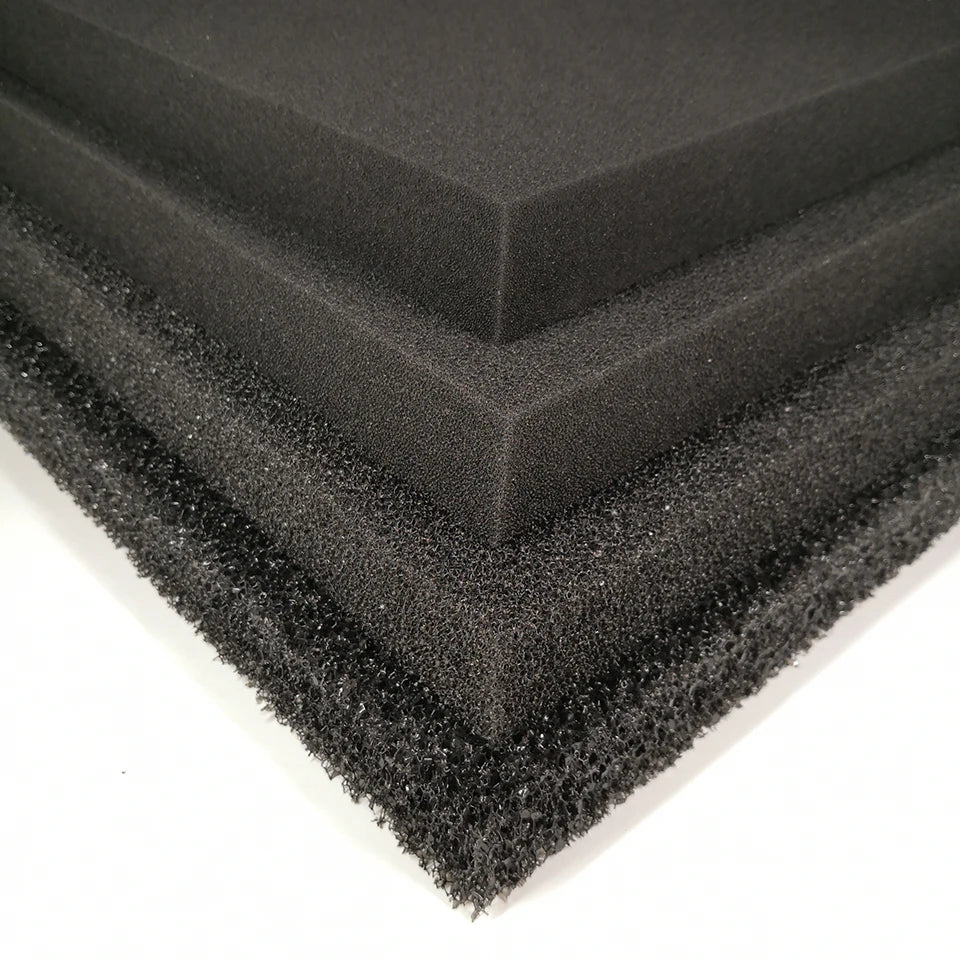 Black acoustic foam panels on a white background