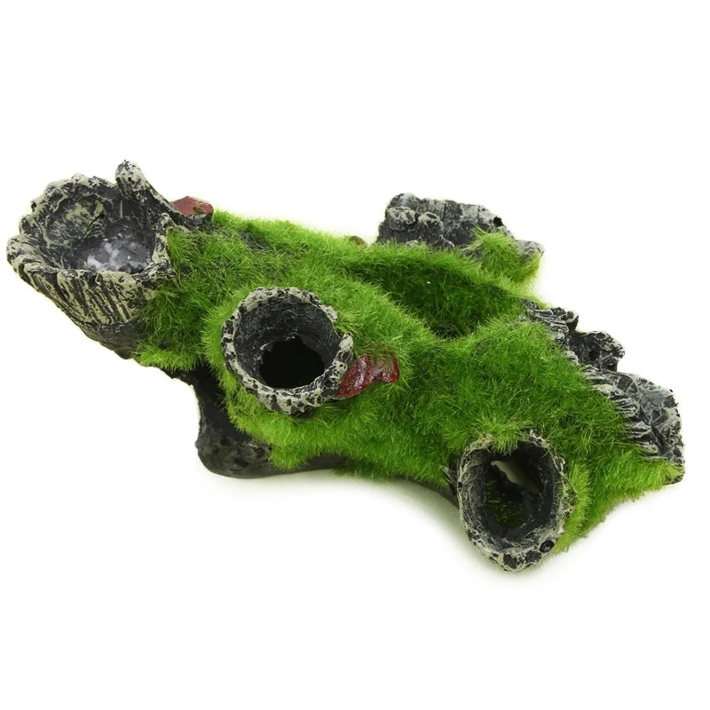Decorative aquarium plant with green moss and black base on a white background