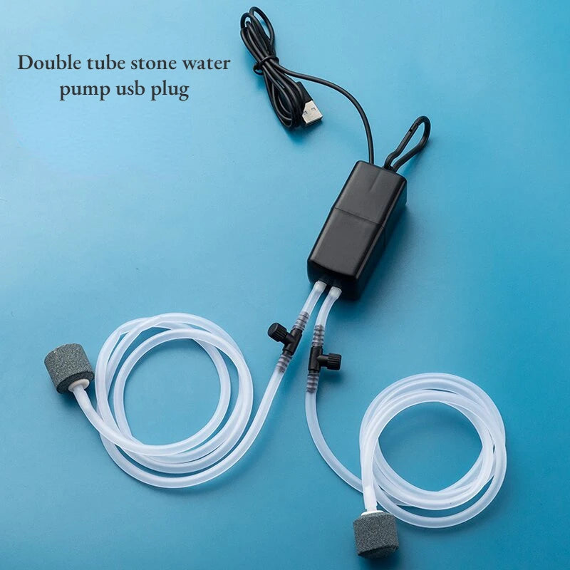 Double tube stone water pump USB plug on a blue background