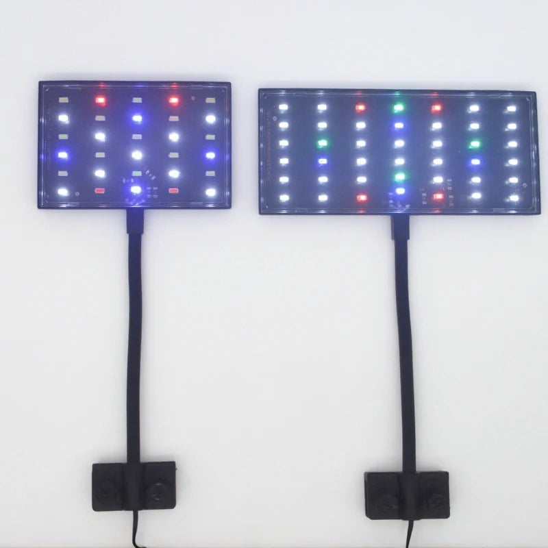 Two rectangular LED light panels with black adjustable stands, shown side by side against a plain white background. The left panel emits blue and red light, while the right panel emits green, red, and white light.