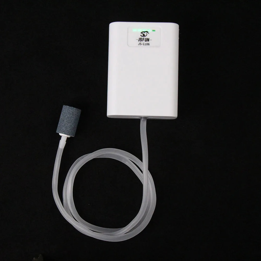 White electronic device with a hose on a black background