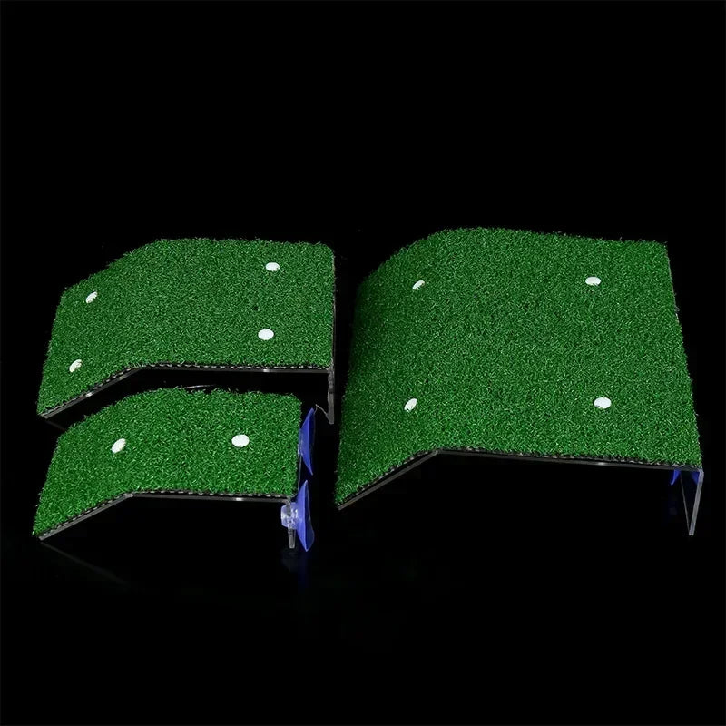 Green artificial grass mat with white dots on a black background
