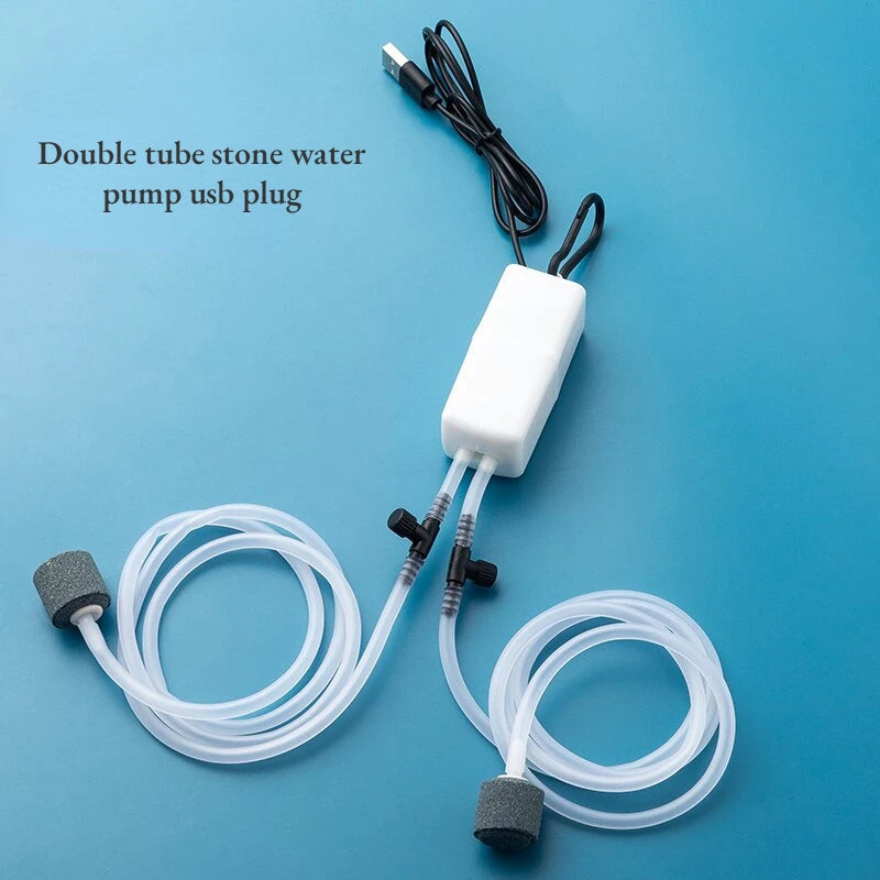 Double tube stone water pump USB plug on a blue background