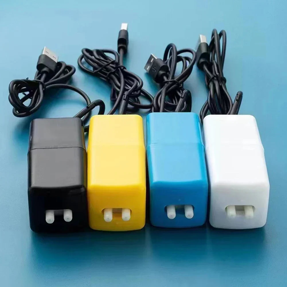 Four colorful power adapters with USB cables on a blue background