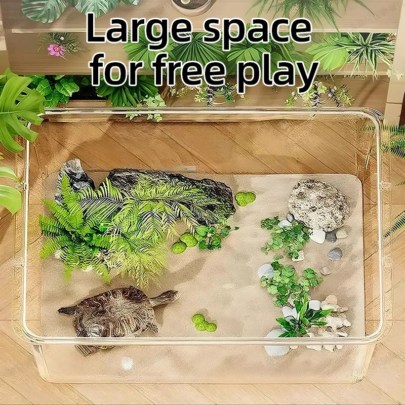 Tortoise tank with a turtle, plants, and rocks on a wooden floor.