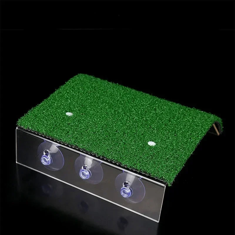 Golf practice mat with grass texture and suction cups on a black background