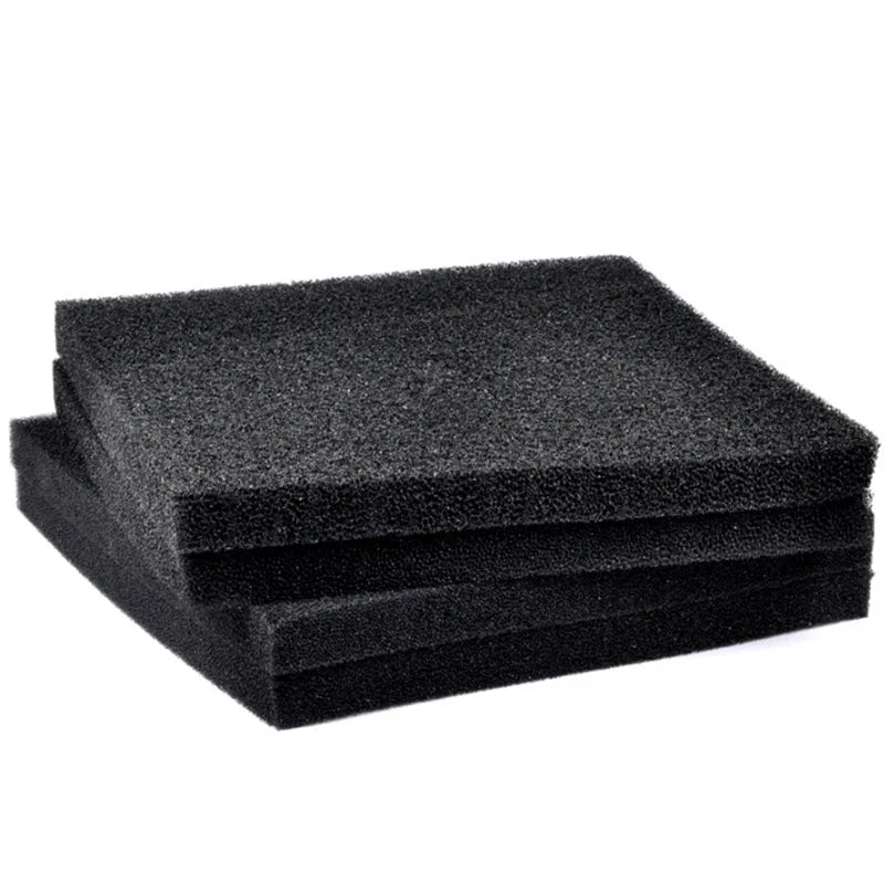 Two black foam filters stacked on a white background