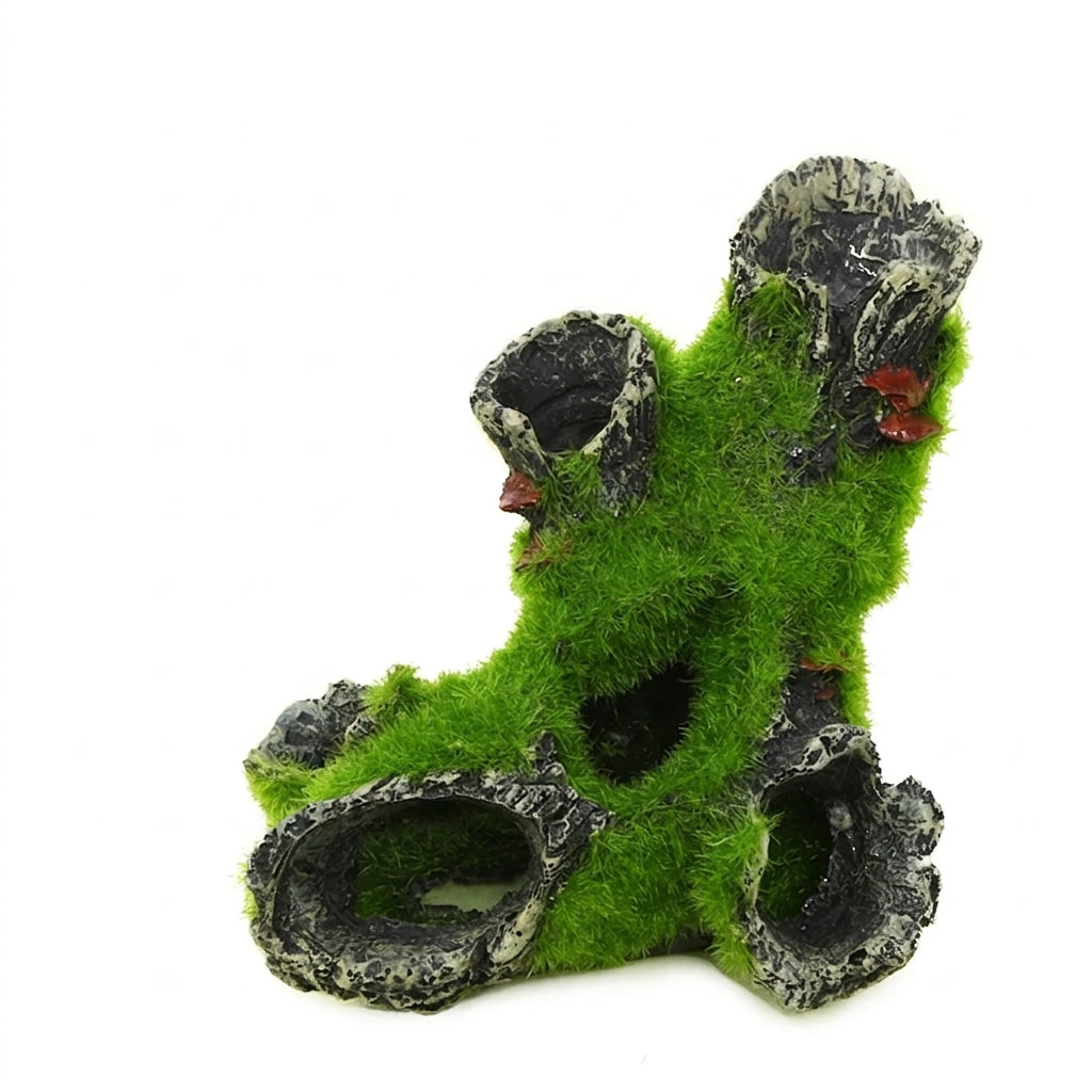 A decorative artificial aquarium hide shaped like a mossy rock with multiple hollow chambers, featuring bright green moss texture and dark gray stone-like openings.
