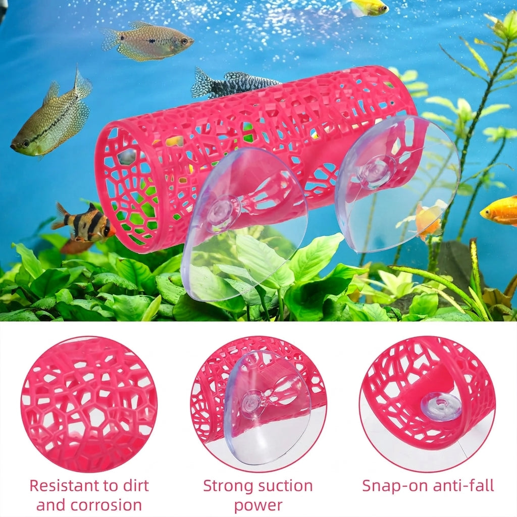 Pink cylindrical plastic fish tank cleaner with clear suction cups, shown above a fish tank scene with fish and plants, plus three circular detail insets with text about dirt resistance, suction power, and anti-fall snap-on design.